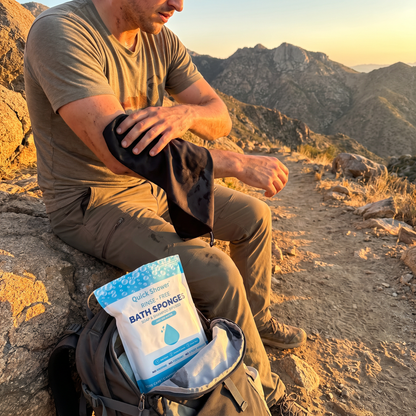 Drying off with the Quick Shower towel on a hike